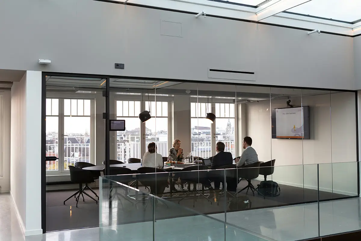 Stockimage of some board members in a meeting room.